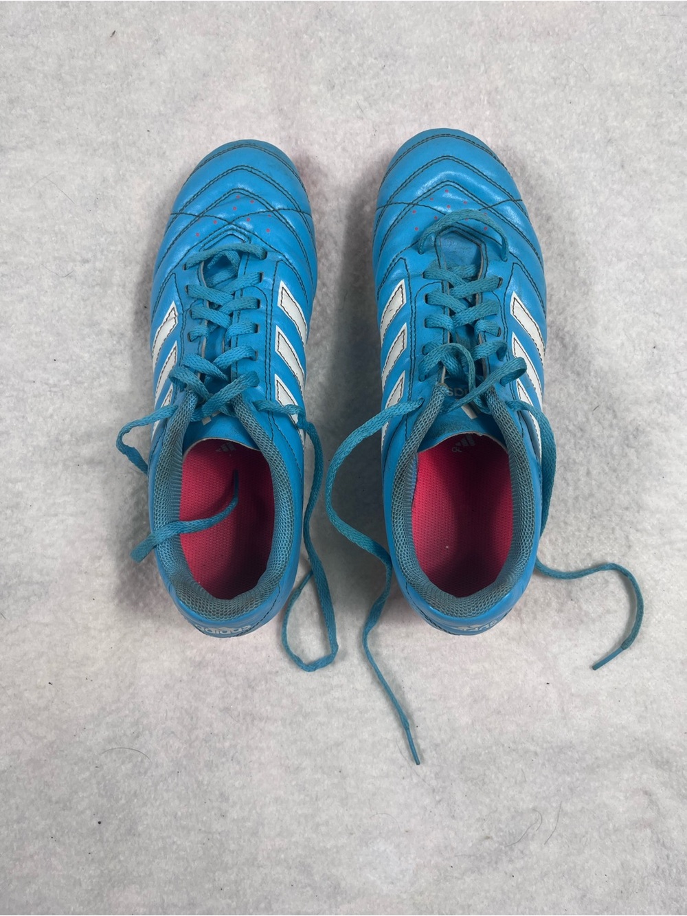 adidas Women’s Blue Soccer Sneakers with White Stripes